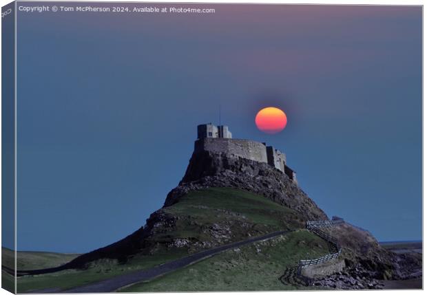 Sunset over Lindisfarne Castle Canvas Print by Tom McPherson