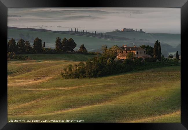 Early morning light on Tuscan hills Framed Print by Paul Edney