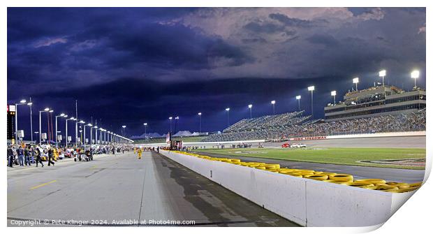 Storm clouds over a Speedway pit lane Print by Pete Klinger