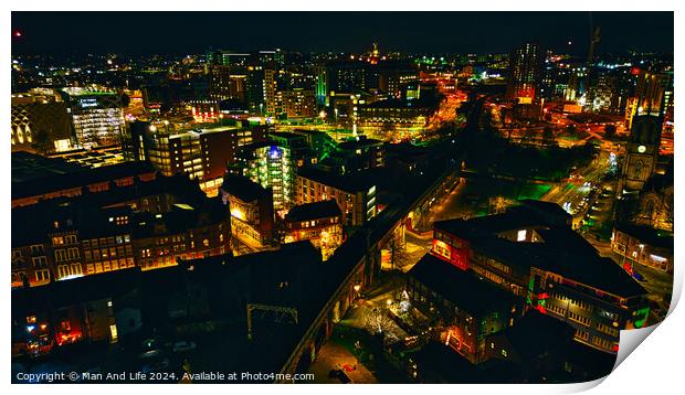 Aerial night view of a vibrant cityscape with illuminated streets and buildings in Leeds, UK. Print by Man And Life