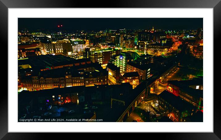 Cityscape at night with illuminated buildings and streets in Leeds, UK. Framed Mounted Print by Man And Life