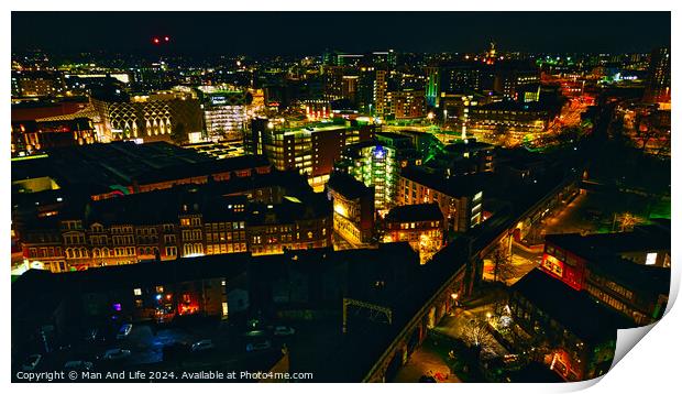 Cityscape at night with illuminated buildings and streets in Leeds, UK. Print by Man And Life