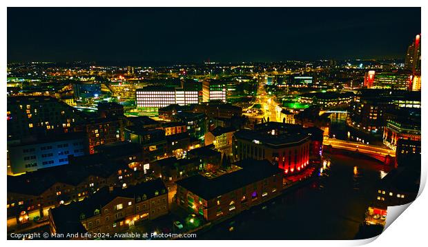 Aerial night view of a vibrant cityscape with illuminated buildings and streets in Leeds, UK. Print by Man And Life