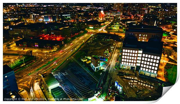 Aerial night view of a vibrant cityscape with illuminated streets and buildings in Leeds, UK. Print by Man And Life