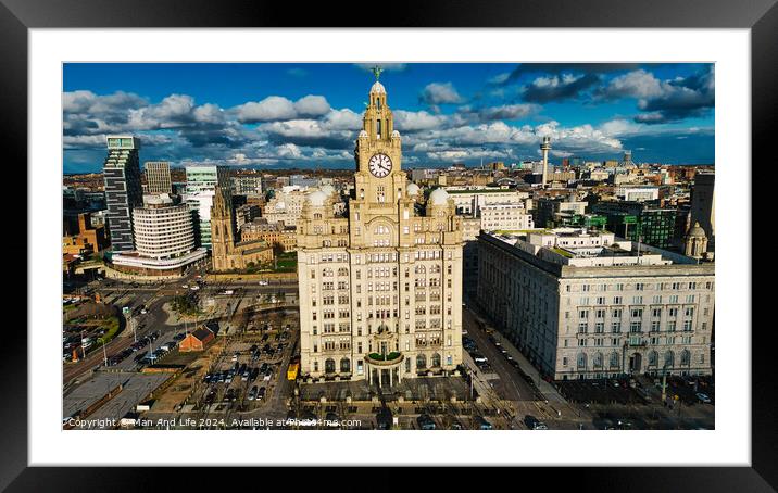Aerial view of a historic clock tower and surrounding buildings under a cloudy sky in Liverpool, UK. Framed Mounted Print by Man And Life