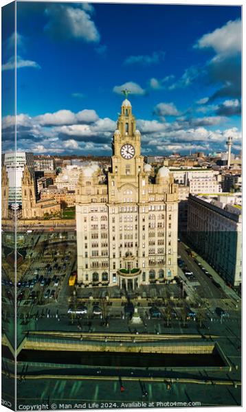 Aerial view of the historic Royal Liver Building in Liverpool, UK, with dramatic clouds in the sky. Canvas Print by Man And Life