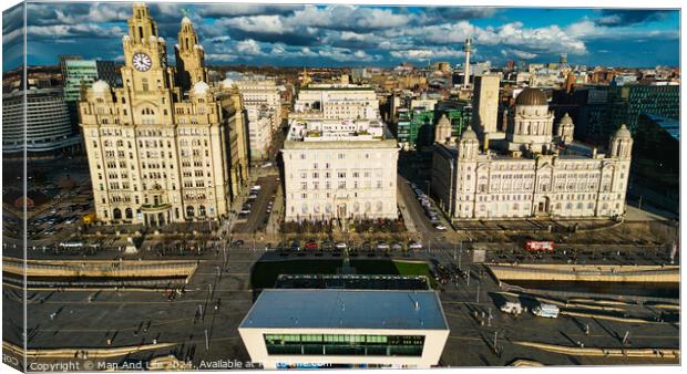 Aerial view of Liverpool's historic waterfront buildings under a dramatic sky. Canvas Print by Man And Life