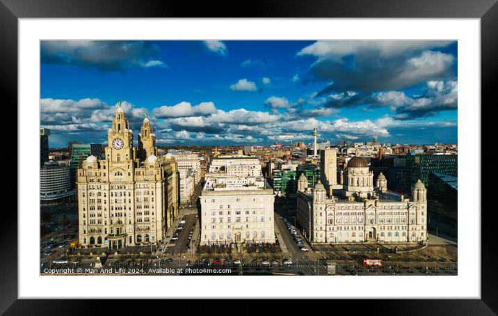 Aerial view of historic waterfront buildings under a dramatic sky with clouds in Liverpool, UK. Framed Mounted Print by Man And Life