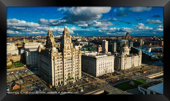 Aerial view of iconic historic buildings under a dramatic sky in Liverpool, UK. Framed Print by Man And Life