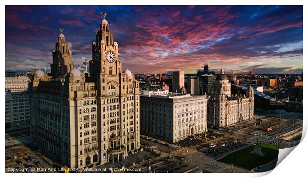 Aerial view of iconic Liverpool waterfront buildings at sunset with dramatic sky. Print by Man And Life