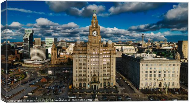 Aerial view of a cityscape with historic buildings under a cloudy sky in Liverpool, UK. Canvas Print by Man And Life