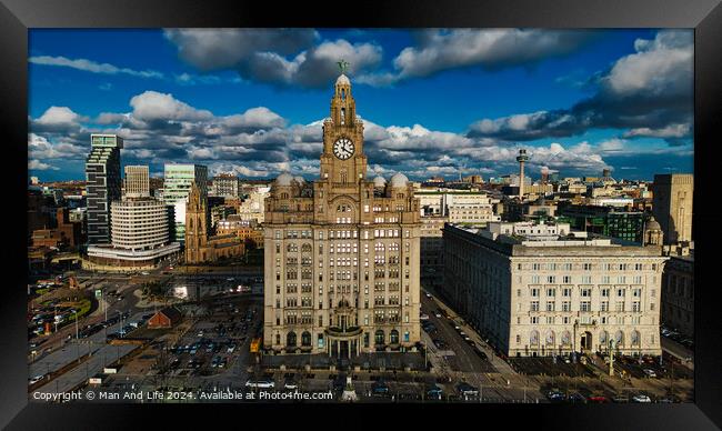 Aerial view of a cityscape with historic buildings under a cloudy sky in Liverpool, UK. Framed Print by Man And Life