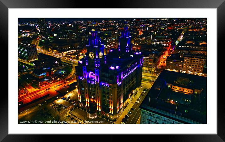 Illuminated historic building at night in urban skyline in Liverpool, UK. Framed Mounted Print by Man And Life