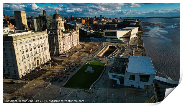 Aerial view of a cityscape with historic buildings and modern architecture near a river under a cloudy sky in Liverpool, UK. Print by Man And Life