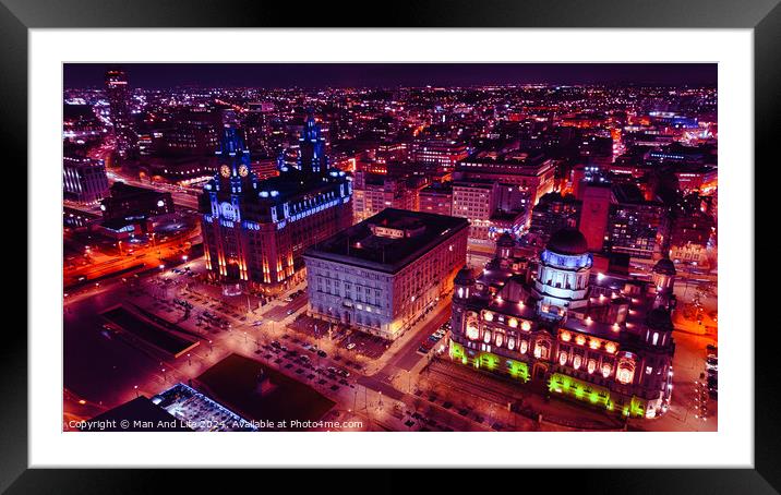 Aerial night view of a vibrant cityscape with illuminated buildings and streets in Liverpool, UK. Framed Mounted Print by Man And Life