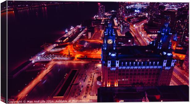 Aerial night view of a cityscape with illuminated streets and buildings in Liverpool, UK. Canvas Print by Man And Life