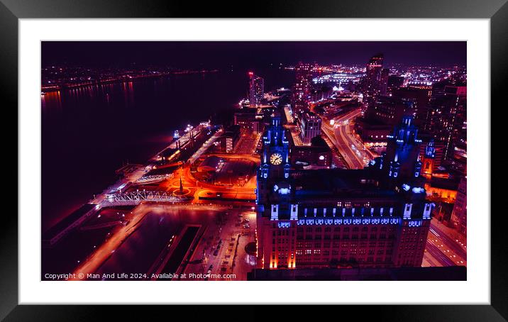 Aerial night view of a vibrant cityscape with illuminated streets and buildings in Liverpool, UK. Framed Mounted Print by Man And Life