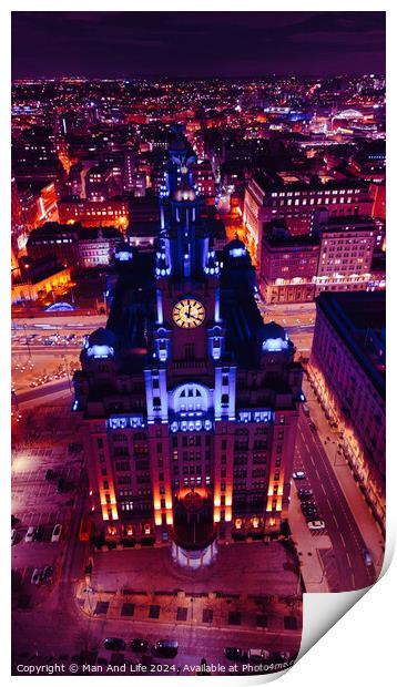 Vertical aerial view of a lit-up cityscape at night with a prominent clock tower and urban streets in Liverpool, UK. Print by Man And Life