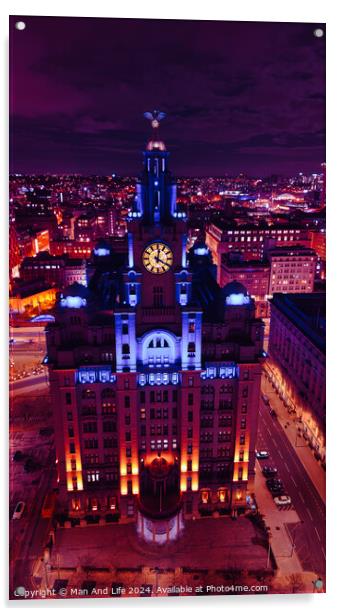 Vertical aerial view of an illuminated historic building at night with city lights in the background in Liverpool, UK. Acrylic by Man And Life
