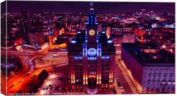 Aerial night view of an illuminated cityscape with a prominent clock tower and urban architecture in Liverpool, UK. Canvas Print by Man And Life