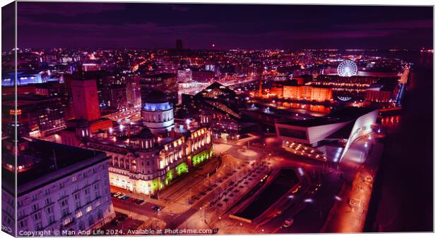 Aerial night view of a vibrant cityscape with illuminated streets and buildings in Liverpool, UK. Canvas Print by Man And Life