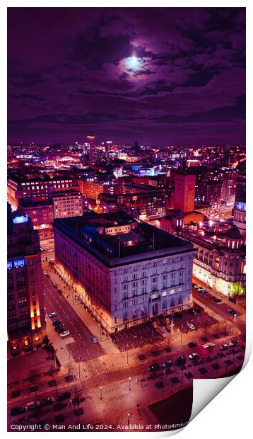 Vertical aerial view of an illuminated historic building at night with city lights in the background in Liverpool, UK. Print by Man And Life