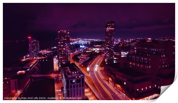 Night cityscape with illuminated buildings and streets, showcasing urban architecture and traffic trails under a purple sky in Liverpool, UK. Print by Man And Life