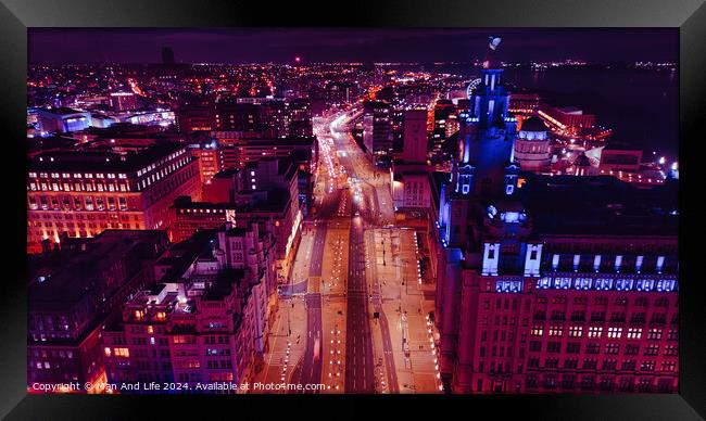 Aerial night view of a cityscape with illuminated streets and buildings, showcasing urban architecture and traffic in Liverpool, UK. Framed Print by Man And Life
