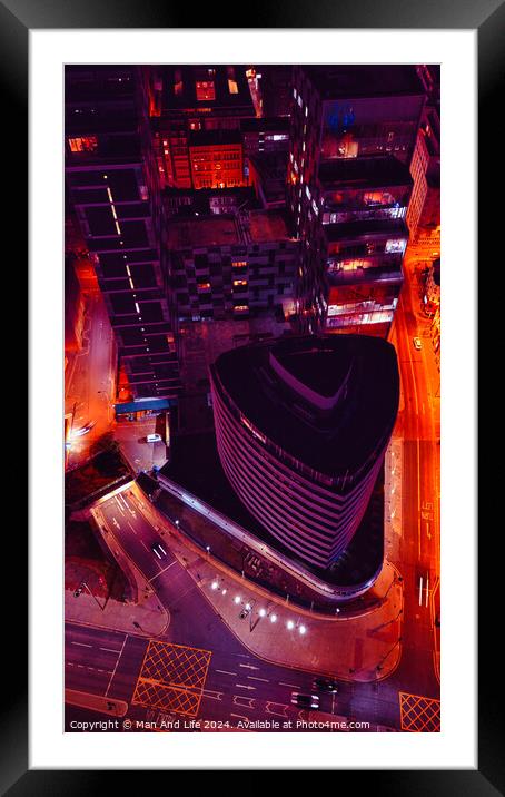 Aerial night view of a cityscape with illuminated streets and modern buildings, showcasing urban architecture and traffic in Liverpool, UK. Framed Mounted Print by Man And Life