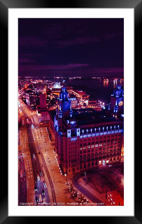 Aerial night view of a cityscape with illuminated streets and buildings, showcasing urban architecture in Liverpool, UK. Framed Mounted Print by Man And Life