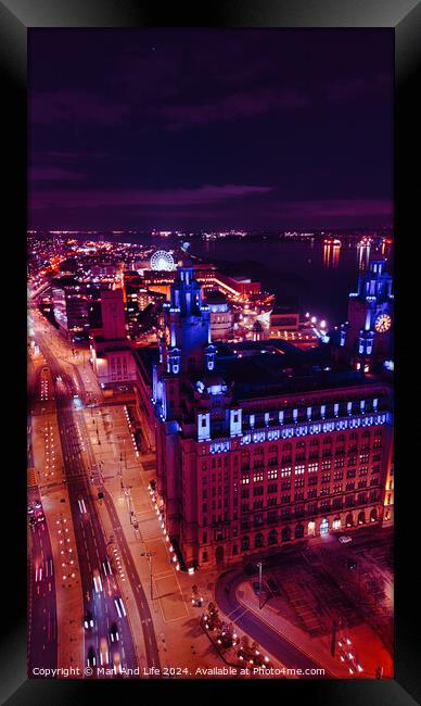 Aerial night view of a cityscape with illuminated streets and buildings, showcasing urban architecture in Liverpool, UK. Framed Print by Man And Life