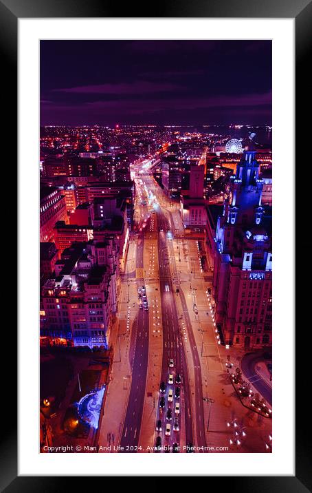 Vertical aerial view of a bustling city street at night with vibrant purple lighting and traffic trails in Liverpool, UK. Framed Mounted Print by Man And Life