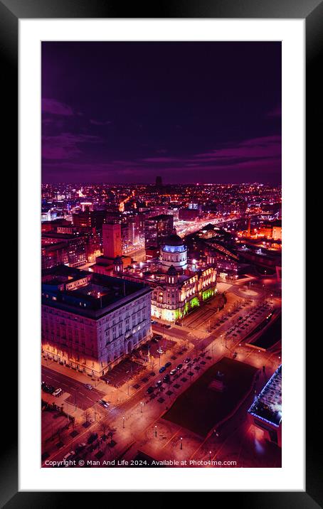 Vertical aerial view of a city at night with illuminated streets and buildings, showcasing urban nightlife in Liverpool, UK. Framed Mounted Print by Man And Life