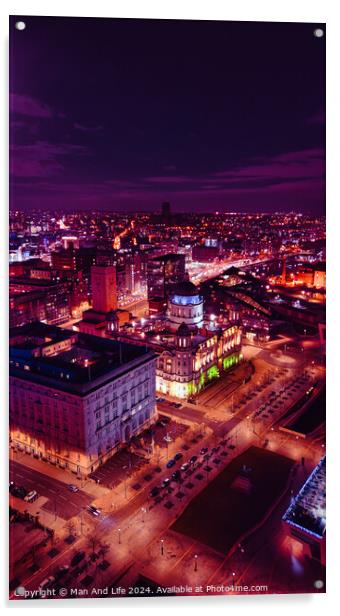 Vertical aerial view of a city at night with illuminated streets and buildings, showcasing urban nightlife in Liverpool, UK. Acrylic by Man And Life