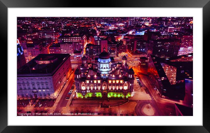 Aerial night view of an illuminated cityscape with historic architecture in Liverpool, UK. Framed Mounted Print by Man And Life