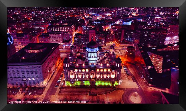 Aerial night view of an illuminated cityscape with historic architecture in Liverpool, UK. Framed Print by Man And Life