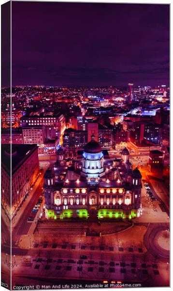 Aerial night view of a cityscape with illuminated buildings and vibrant urban lights in Liverpool, UK. Canvas Print by Man And Life