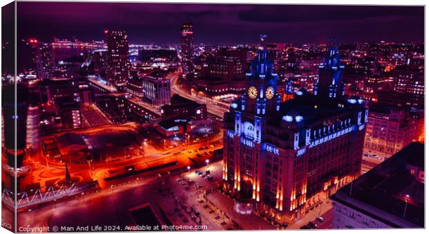 Night cityscape with illuminated buildings and streets, showcasing urban architecture and vibrant nightlife in Liverpool, UK. Canvas Print by Man And Life