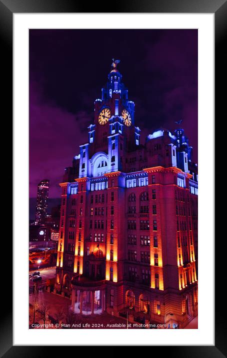 Dramatic night view of an illuminated historic building with clock tower against a twilight sky in Liverpool, UK. Framed Mounted Print by Man And Life