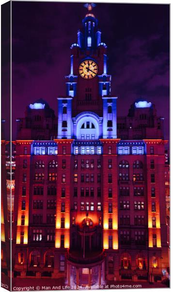 Illuminated historic building at night with clock tower against a twilight sky in Liverpool, UK. Canvas Print by Man And Life