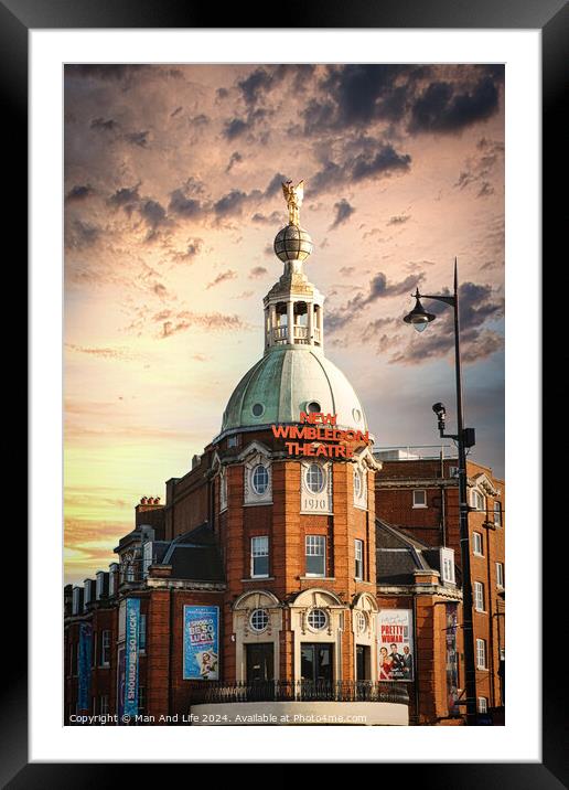 Dramatic sky over Wimbledon Theatre with golden sunset light illuminating the building's facade and dome. Framed Mounted Print by Man And Life