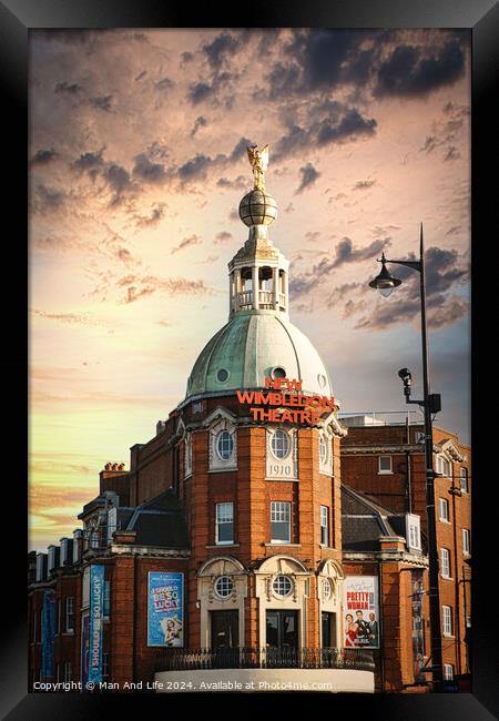 Dramatic sky over Wimbledon Theatre with golden sunset light illuminating the building's facade and dome. Framed Print by Man And Life