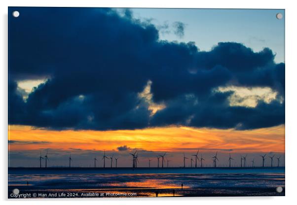 Sunset over sea with silhouette of offshore wind turbines, vibrant sky, and reflection on water in Crosby, England. Acrylic by Man And Life