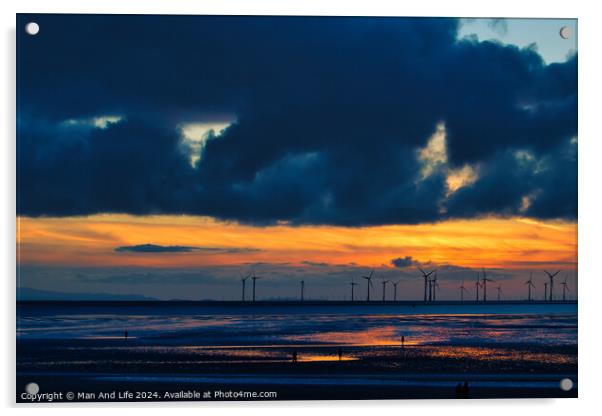 Dramatic sunset over a beach with silhouetted wind turbines on the horizon and reflective wet sand in Crosby, England. Acrylic by Man And Life