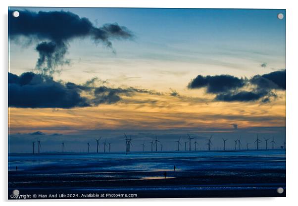 Serene sunset over a wind farm with silhouettes of turbines and dramatic clouds, reflecting on water in Crosby, England. Acrylic by Man And Life