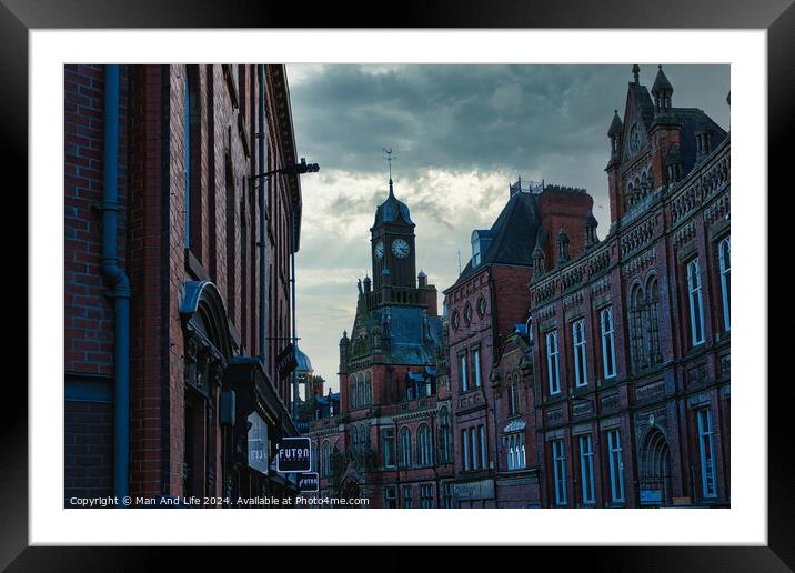 Historic European cityscape with clock tower at dusk, moody sky, and vintage architecture in York, UK. Framed Mounted Print by Man And Life