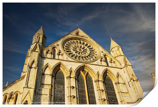 Gothic cathedral facade with rose window under blue sky in York, UK. Print by Man And Life