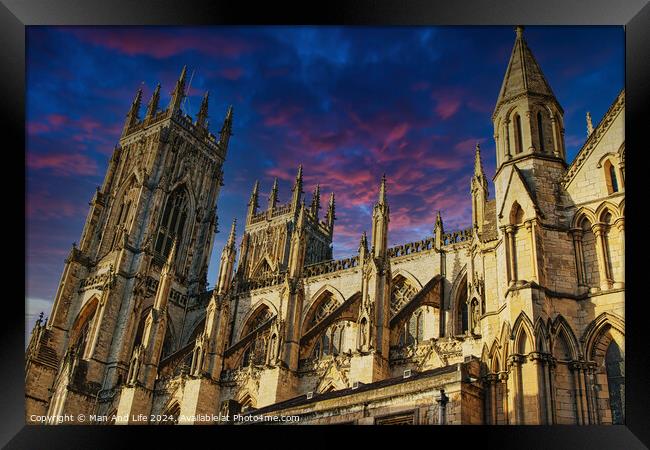 Majestic medieval cathedral against a vibrant sunset sky in York, UK. Framed Print by Man And Life