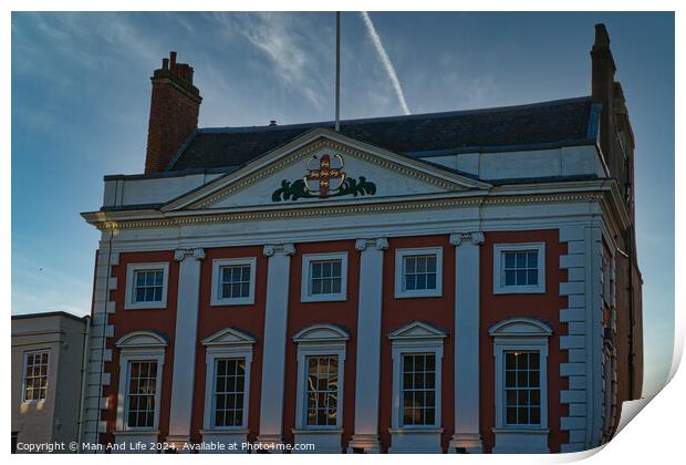 Classic red and white building facade with clear blue sky at dusk in York, UK. Print by Man And Life