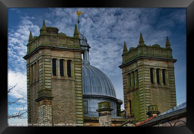Dramatic sky over twin stone towers with a metallic dome, showcasing architectural details and moody ambiance in Harrogate, England. Framed Print by Man And Life